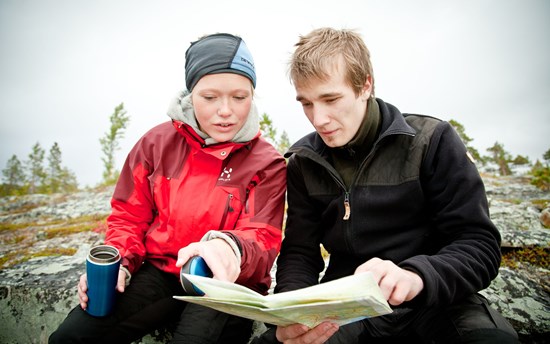 Reading a Map in the Arctic  PHOTO: Tommy Hansen