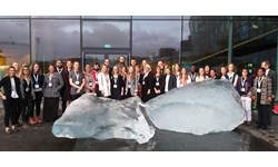 Students, staff and faculty at the Arctic Circle in front of Icebergs from Kommuneqarfik Sermersooq Municipality in Greenland.