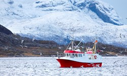 Fishing Boat At Sea In Arctic Environment PHMUB6H