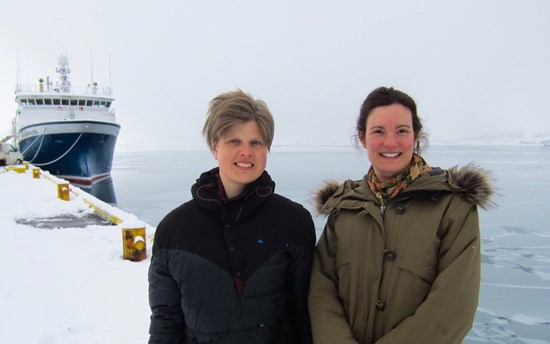 Dr. Catherine Chambers, to the right and Dr. Pernilla Carlsson to the left at the harbor in Ísafjörður