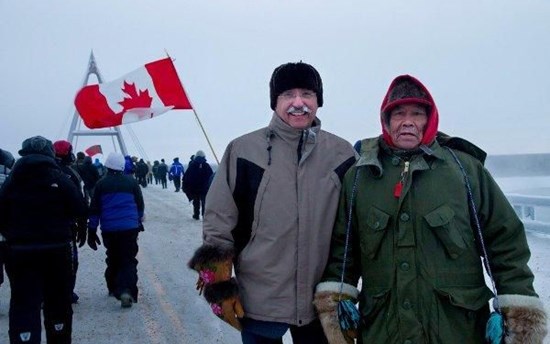 Dennis Bevington (MP, Western Arctic) with Elder Sam Elleze at the opening of the Deh Cho Bridge over the Mackenzie River near Fort Providence, Northwest Territories, Canada  PHOTO: Dennis Bevington