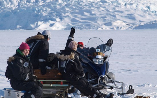 Kristen Peck on a snowmobile in Svalbard