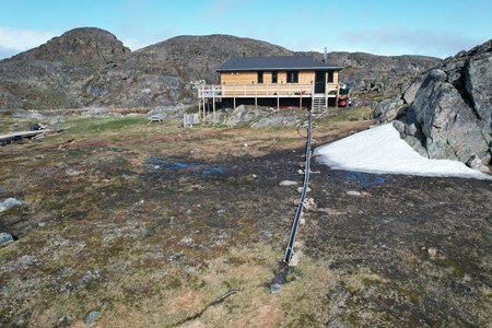 Erfalik Lodge and its greywater pipe.