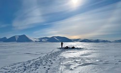 A member of Roland Kallenborn’s team takes snow and ice samples in the Arctic.   PHOTO: Roland Kallenborn