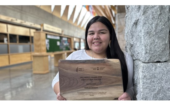 First Nations Studies student Sarah Dixon holds the plaque she received during National Forest Week this past fall